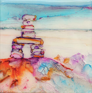 painting of a stone landmark - inuksuk standing on a stones on a beach done with alcohol inks and mixed media on Yupo paper and mounted on 6 x 6x 1.5 inches wood panel